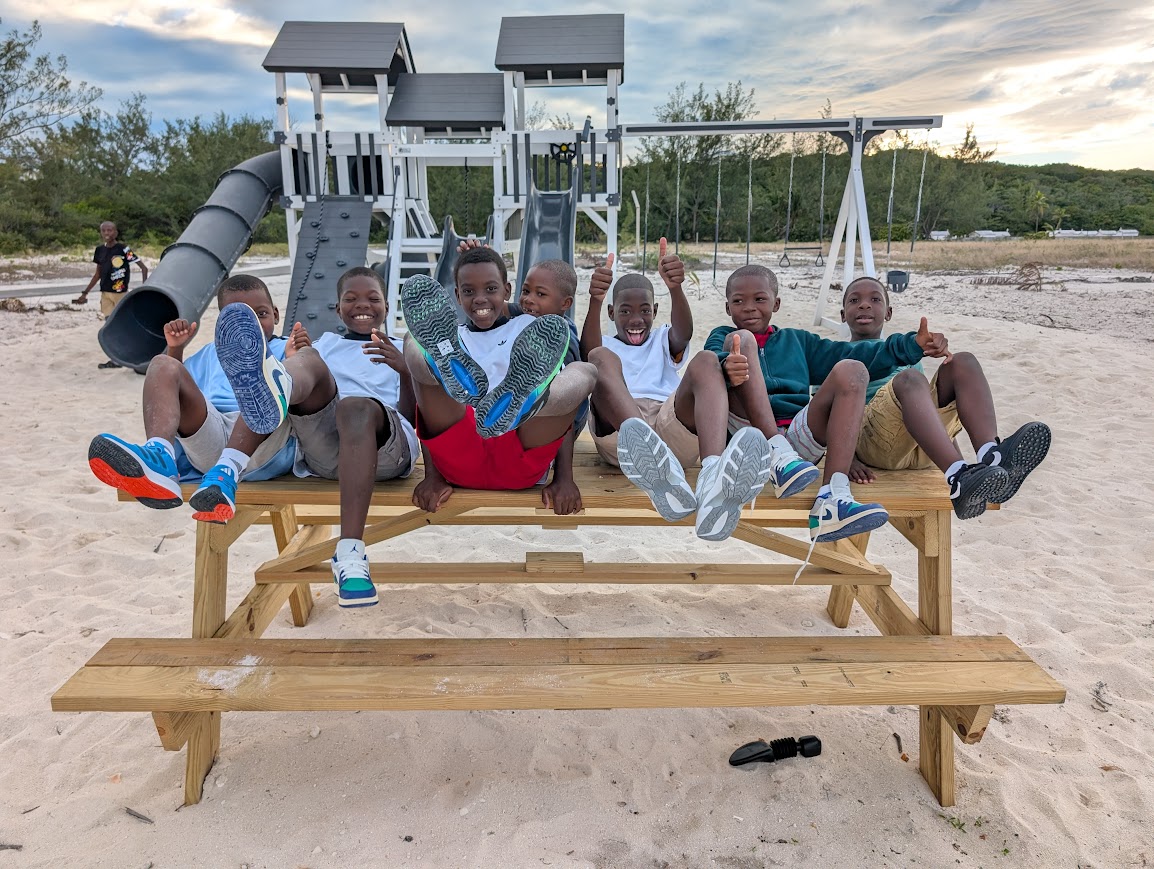 Children of Rolleville enjoying the new Maud Anderson Park playset
